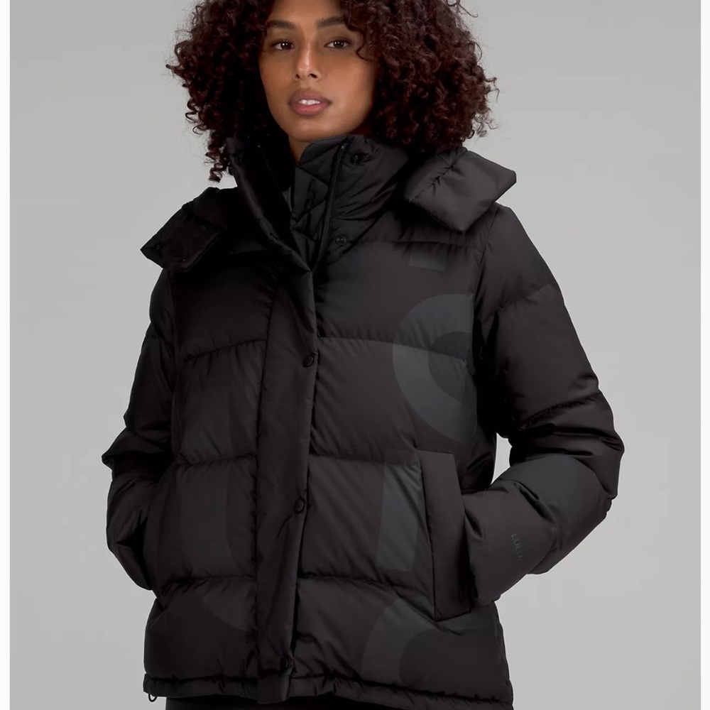 Never worn black wonder puff jacket wordmark